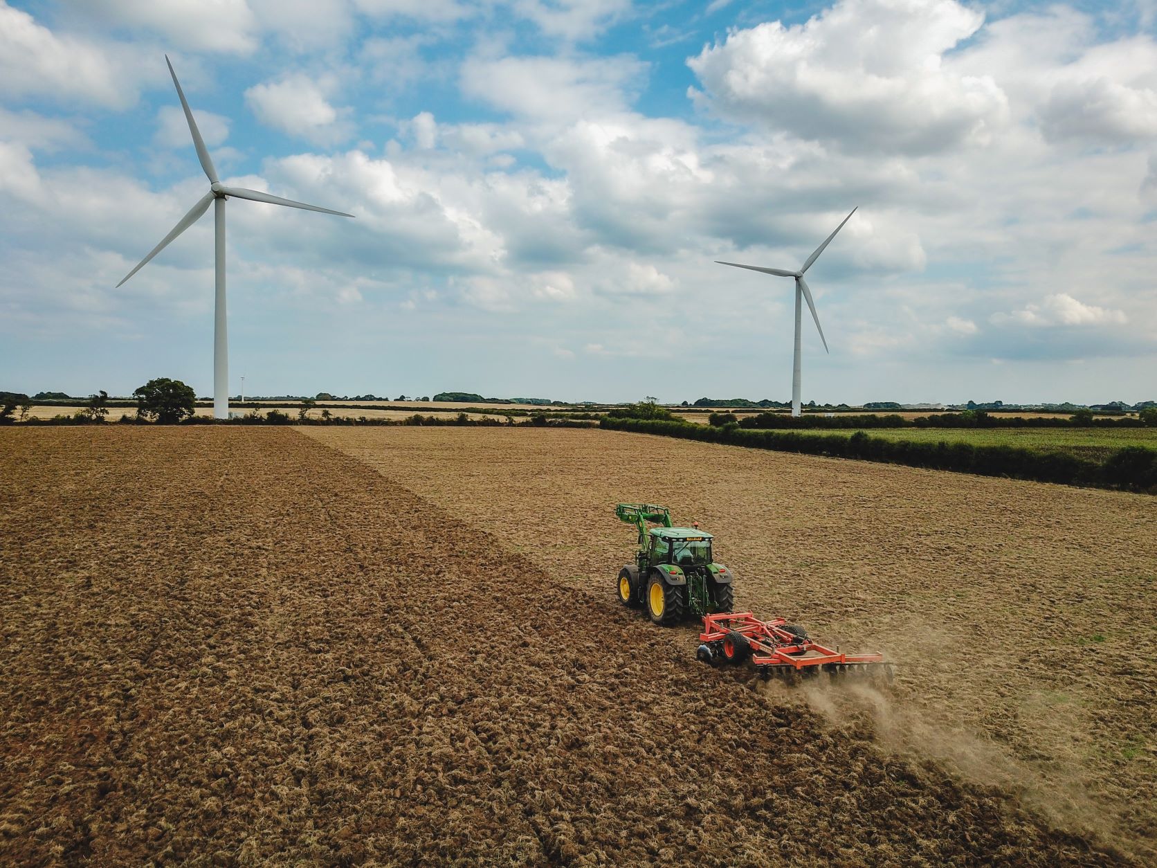Farm worker on a tractor